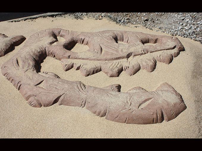 Oregon Hills Park public art project closeup of cement dinosaur head