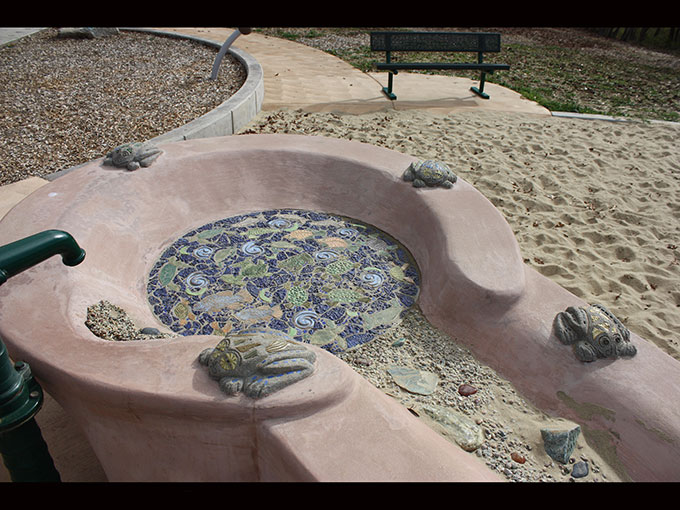 Oregon Hills Park public art project water-life mosaic and frogs on water trough
